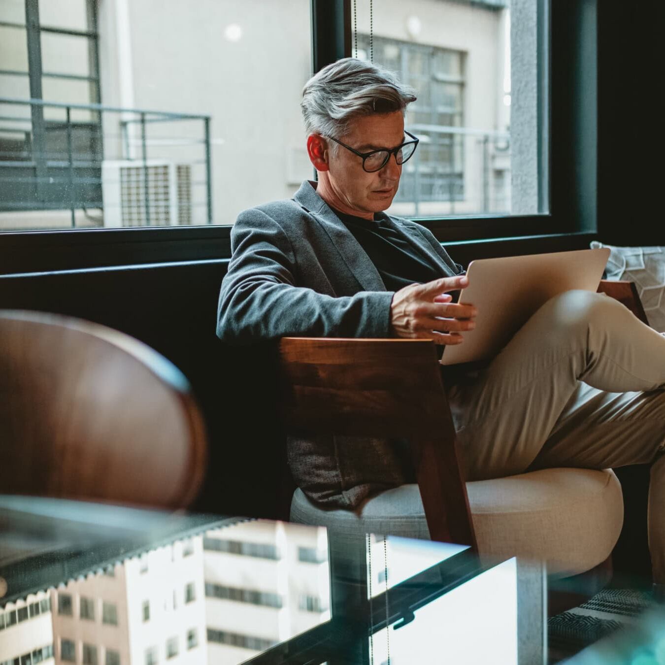 Coaching educator offering feedback during a practical exercise.