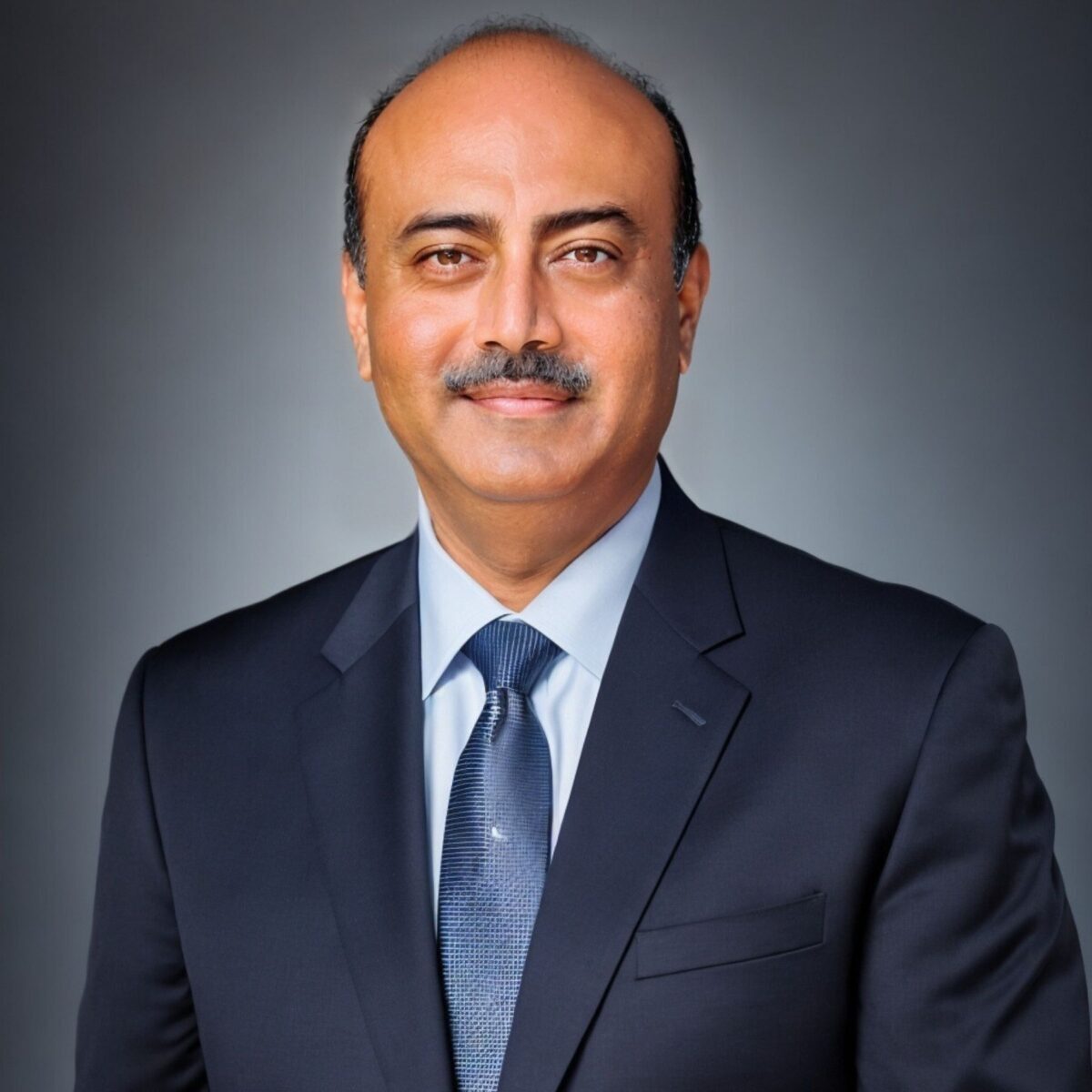 Headshot of Bhootra + Deepak, blog author with the International Coaching Federation. Known for evidence-based coaching, combining neuroscience, behavioral change, and performance psychology. leaders.