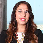 Headshot of Rania Laing, PCC and Former UAE Chapter President with the International Coaching Federation. Known for her 25+ years of strategic experience, she merges coaching with UN SDG impact management.