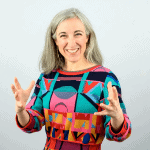 Headshot of Lise Bruynooghe, MCC with the International Coaching Federation. Known for coaching global leaders and teams in the Swiss mountains.